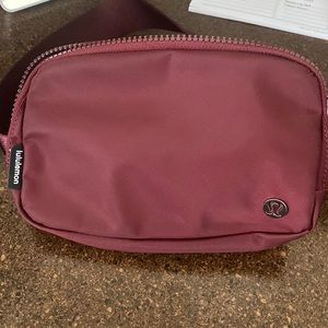 Lululemon maroon belt bag, comes with reusable lulu bag as well